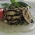 Tortino di melanzane, gamberi e zucchine in fiore