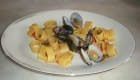 Calamarata con vongole veraci e rucola