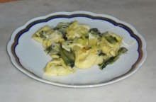 Ravioli di magro con cicoria e mozzarella gratinati al forno