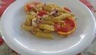 Penne con calamari, pomodorini e arancia