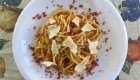 Spaghetti ai porri, speck croccante e pecorino