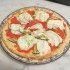Focaccia al farro, pomodori, melanzane e pecorino