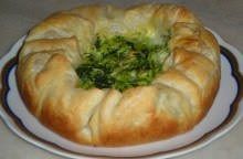Torta salata sfiziosa con cime di rapa e olive rosatelle