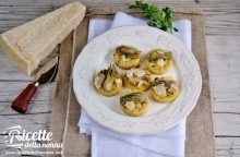 Medaglioni di polenta ai carciofi