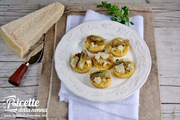 Medaglioni di polenta e carciofi ricetta e foto