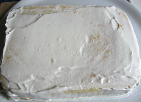 Ricoprire la torta con la panna montata