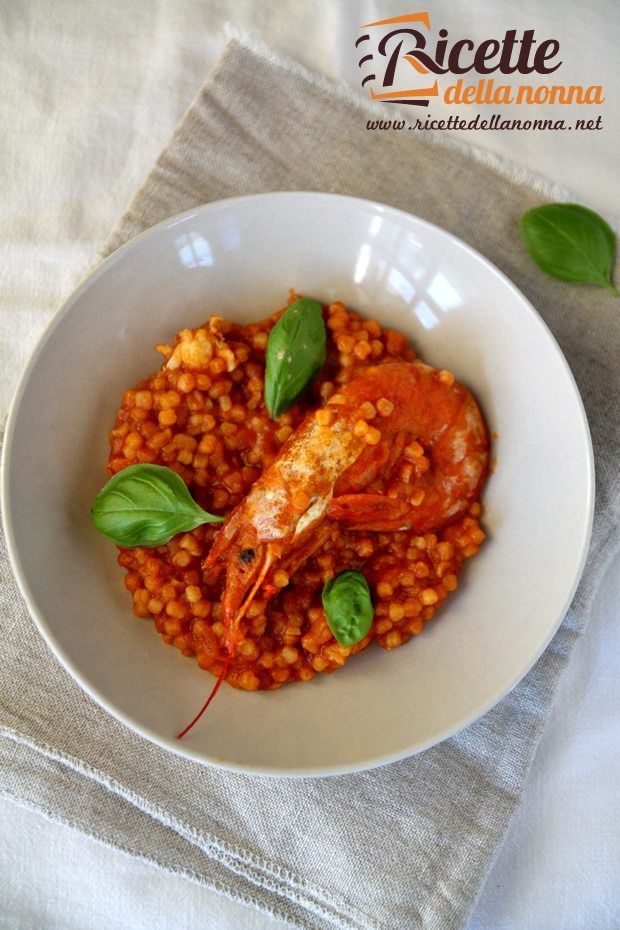 Foto Fregola con gamberi e scampi