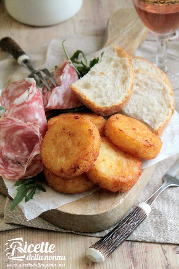 Foto frittelle di patate e cipolle