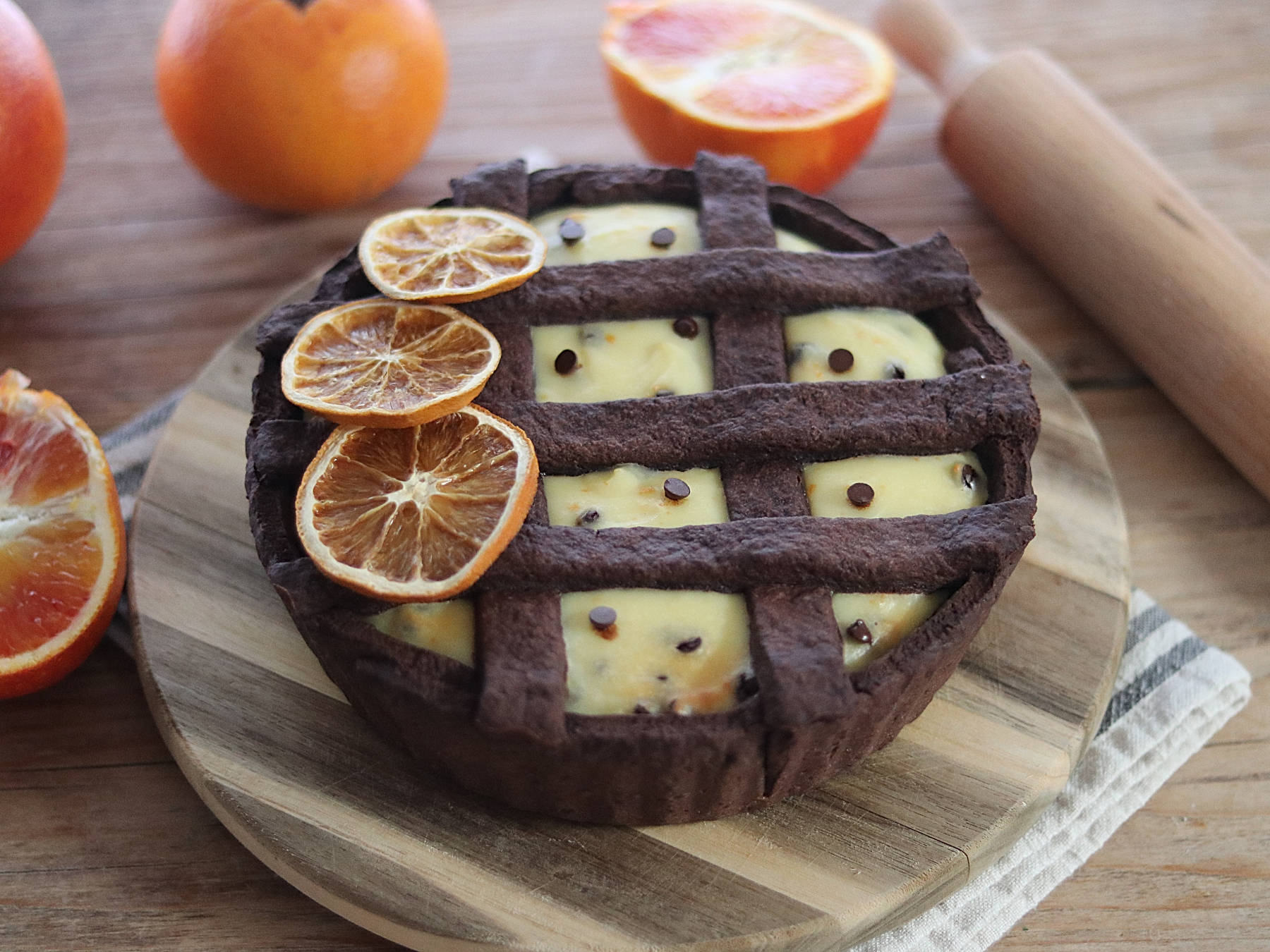 Crostata al cacao con ricotta e arancia