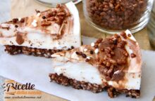 Base di riso soffiato al cioccolato fondente, crema di Philadelphia e panna ricoperta di Nutella: la cheesecake alla Nutella è irresistibile